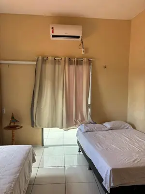 Uma cama ou camas num quarto em Casa jeri de prata