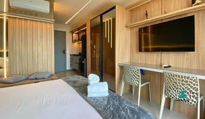 Uma cama ou camas num quarto em Beach Class Meireles by Holiday Stays