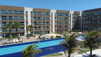 A piscina em ou perto de Apt p 7 pessoas pé na areia com vista Mar