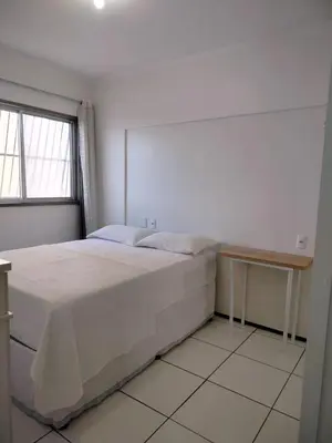 Uma cama ou camas num quarto em Estoril e Algarve