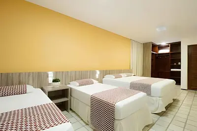 Uma cama ou camas num quarto em MansãoVistaMar-BEACH PARK-35Pessoas - HOUSINGCEARÁ