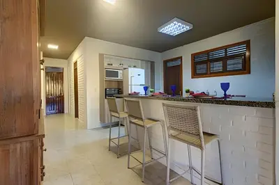 A cozinha ou kitchenette de Aconchegante-8Suítes-28Pessoas - HOUSINGCEARÁ