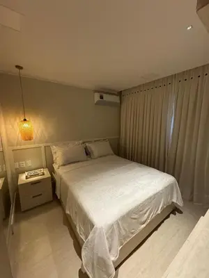 Uma cama ou camas num quarto em Flat Beira Mar Meireles