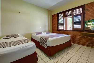 Uma cama ou camas num quarto em Super Luxo BEACH PARK - 20 Pessoas - HOUSINGCEARÁ