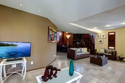 Uma televisão e/ou sistema de entretenimento em Super Luxo BEACH PARK - 20 Pessoas - HOUSINGCEARÁ