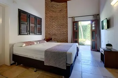 Uma cama ou camas num quarto em Casa Luxo 7 Suítes Próx.Beach Park By HOUSINGCEARÁ