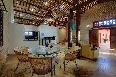 Uma televisão e/ou sistema de entretenimento em Casa Luxo 7 Suítes Próx.Beach Park By HOUSINGCEARÁ