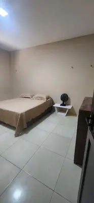 Uma cama ou camas num quarto em Chácara Estrela da Manhã