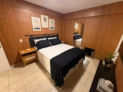 Uma cama ou camas num quarto em Benfica Village