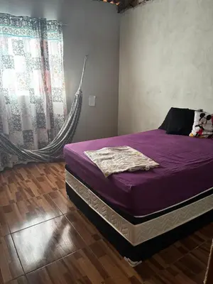 Uma cama ou camas num quarto em Vieira Mar jorlandia