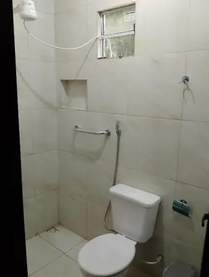Uma casa de banho em Pousada Casa São Carlos chalé Julyana