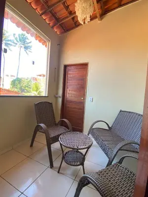 Uma área de estar em Flat flecheiras