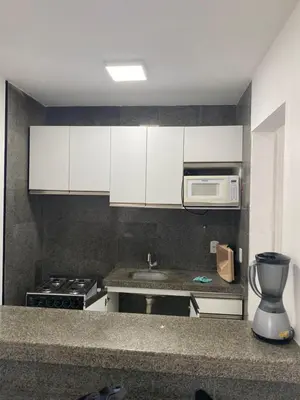 A cozinha ou kitchenette de Flat via venetto vista mar