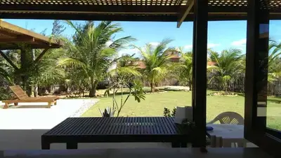 Um jardim no exterior de Kite House Taíba