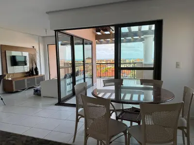 Uma área de estar em Cobertura Dunas Prime