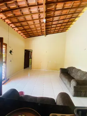 Uma área de estar em Sítio Jean Barros