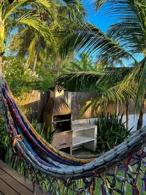 Um jardim no exterior de Casa Kiteloop Icaraizinho