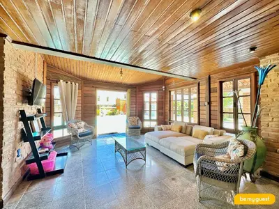 Uma cama ou camas num quarto em Linda casa ampla próximo ao mar do Cumbuco