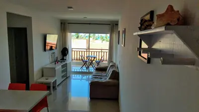 Uma área de estar em Apartamento cumbuco 201