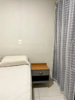 Uma cama ou camas num quarto em Por do Sol Praia Hotel