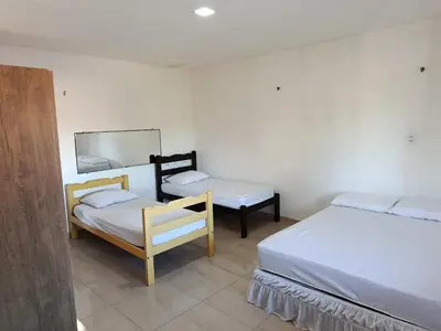 Uma cama ou camas num quarto em Casa dunna azul
