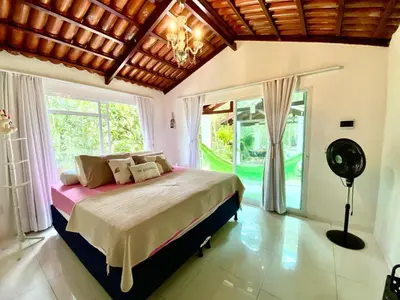 Uma cama ou camas num quarto em Complexo Claudia Leal na serra de Guaramiranga