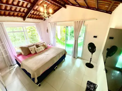 Uma cama ou camas num quarto em Complexo Claudia Leal na serra de Guaramiranga