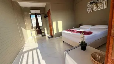 Uma cama ou camas num quarto em pousada calango