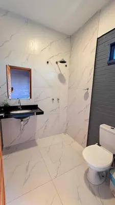 Uma casa de banho em pousada calango