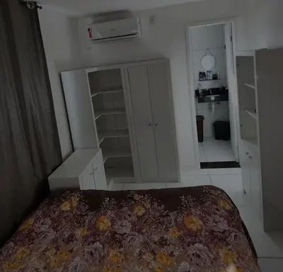 Uma cama ou camas num quarto em Apartamento Porto das dunas