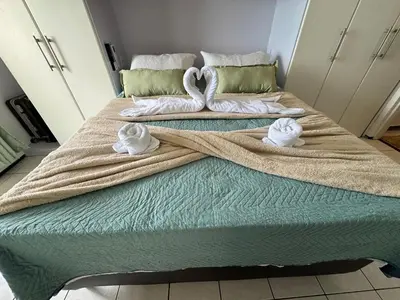 Uma cama ou camas num quarto em Apartamento vista mar no mucuripe