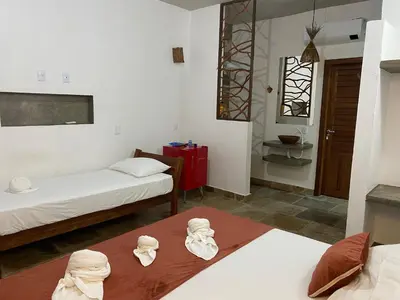 Uma cama ou camas num quarto em Casa Nossa Preá