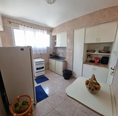 A cozinha ou kitchenette de Praia do Futuro apartamento para amigos e familiares
