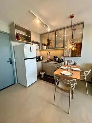 A cozinha ou kitchenette de Apartamento Sofisticado Beach Class Beira Mar