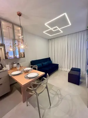 Uma área de estar em Apartamento Sofisticado Beach Class Beira Mar