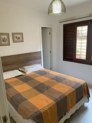 Uma cama ou camas num quarto em Casa boa vida