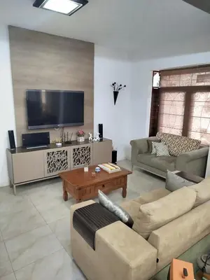Uma televisão e/ou sistema de entretenimento em Casa boa vida