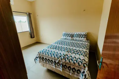 Uma cama ou camas num quarto em Casa em Barra Nova
