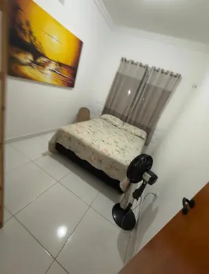 Uma cama ou camas num quarto em Grace Palace