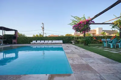 A piscina em ou perto de Casa com Piscina, Churrasqueira e WiFi Cumbuco