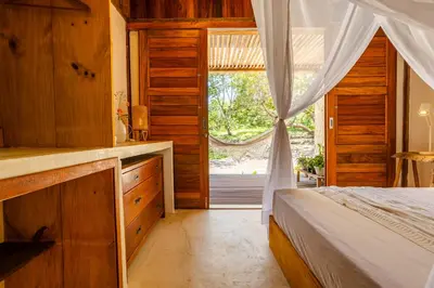 Uma cama ou camas num quarto em Casa Yemanjá