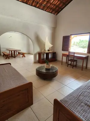 Uma cama ou camas num quarto em Sítio Lagoa das Libélulas