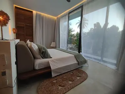 Uma cama ou camas num quarto em Le rêve des kitesurfeurs