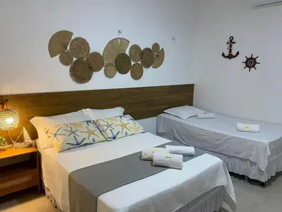 Uma cama ou camas num quarto em AiQCasaPreá