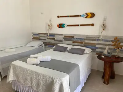 Uma cama ou camas num quarto em AiQCasaPreá