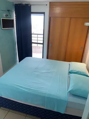 Uma cama ou camas num quarto em FortalezAmar Hotel Praia Mansa