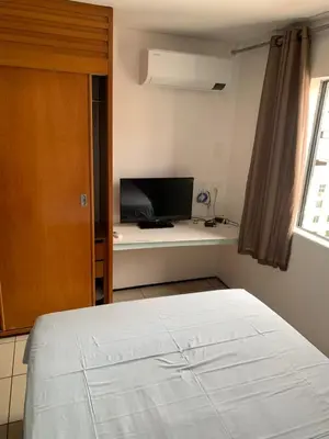 Uma cama ou camas num quarto em FortalezAmar Hotel Praia Mansa