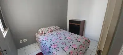 Uma cama ou camas num quarto em AP Bairro Araturi-Próximo a Praia do Icaraí Caucaia-CE