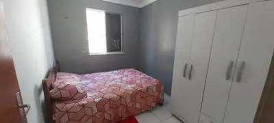 Uma cama ou camas num quarto em AP Bairro Araturi-Próximo a Praia do Icaraí Caucaia-CE