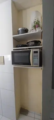 A cozinha ou kitchenette de AP Bairro Araturi-Próximo a Praia do Icaraí Caucaia-CE